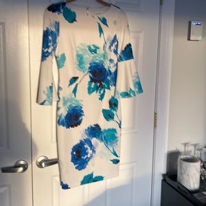 White Calvin Klein dress with shades of blue throughout